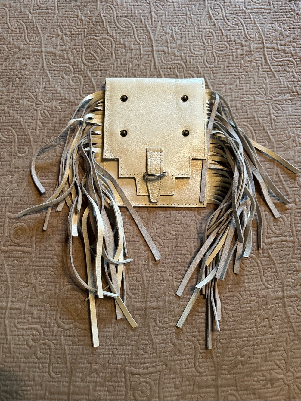 Pure Dixie Aztec Ivory Mini Crossbody Bag with fringe.
